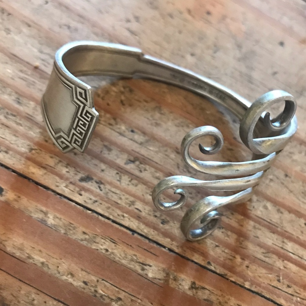 Elegant Silver Swirl Bracelet